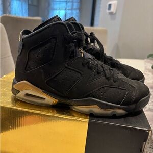 Jordan Black and Gold Sneakers